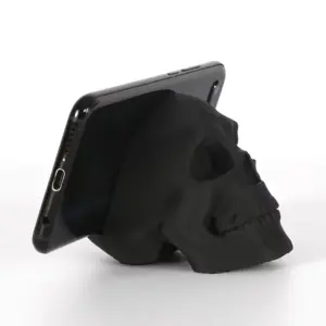 Black Skull Desktop Décor with Phone Stand feature