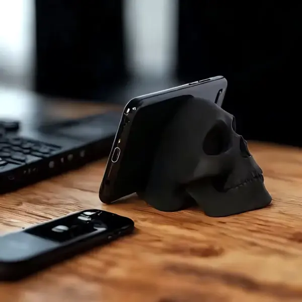 Black Skull Desktop Décor with Phone Stand on table