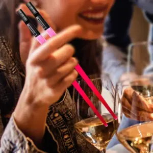 Girl Holding LED Glowing Chopsticks