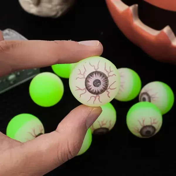 Glow in the Dark Eyeball Bouncy Balls in hand