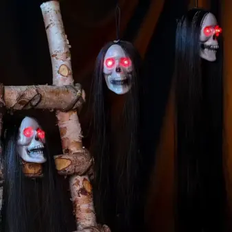 Hanging Ghost Skull Halloween Prop in night