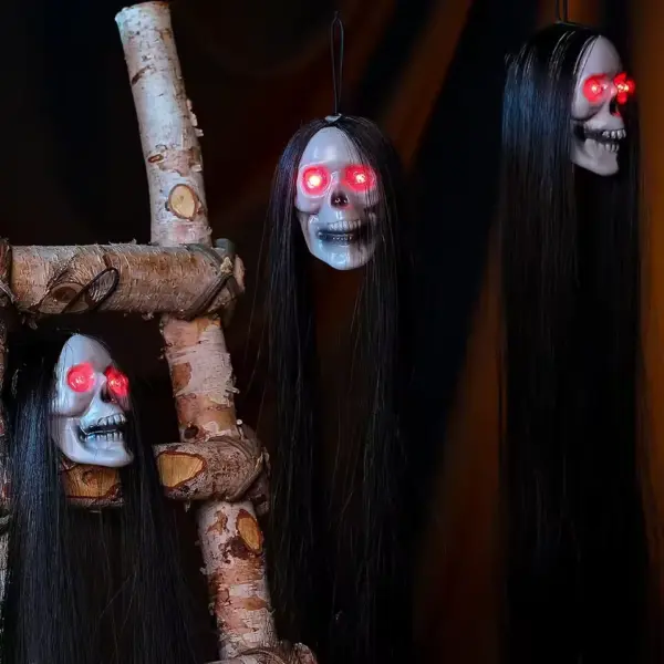 Hanging Ghost Skull Halloween Prop in night