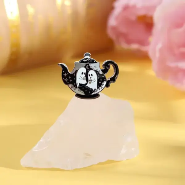 Haunted Teapot Enamel Pin – Cute Ghost Hard-Enamel Lapel Pin for Jackets, Bags & Collector on rock